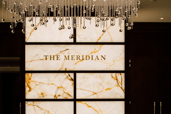 A close up of the sign for the meridian